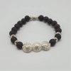 Armband mit 3 Silberornamenten schwarz