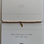 Armband mit Feder