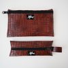 Flaches Etui aus Eco pelle Schlangenoptik braun