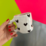 Tasse Herzen schwarz